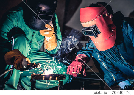 Metal welding steel works using electric arc welding machine Metal welding steel works using electric arc welding machine 70230370