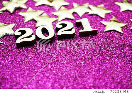 Happy New year 2021 with space copy on purple glitter background Happy New year 2021 with space copy on purple glitter background 70238448