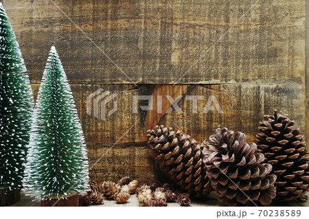 Christmas Festive background concept decoration with Christmas tree and pine cones on wooden background 70238589
