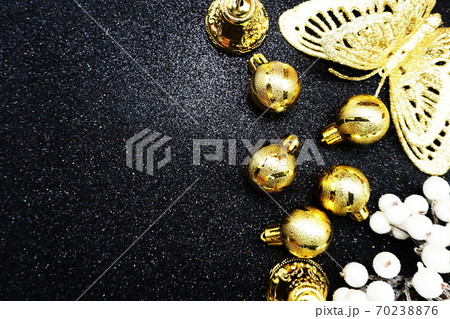 Christmas balls composition with space copy on Black glitter background Christmas balls composition with space copy on Black glitter background 70238876