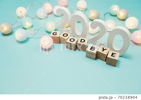 Goodbye 2020 alphabet letters with space copy on blue background 70238904