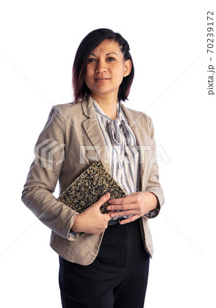 Young Asian woman dressed with a book Young Asian woman dressed with a book 70239172