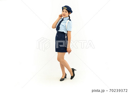 婦人警官のコスプレをする女性の写真素材
