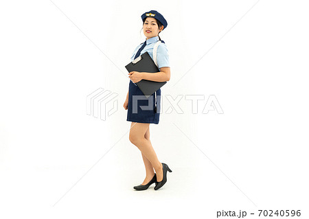 婦人警官のコスプレをする女性の写真素材