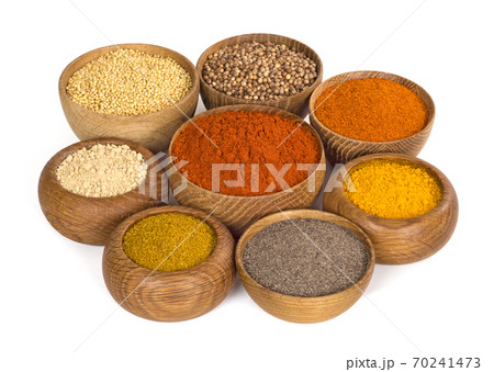 spices and seasoning in wooden bowl on white background spices and seasoning in wooden bowl on white background 70241473