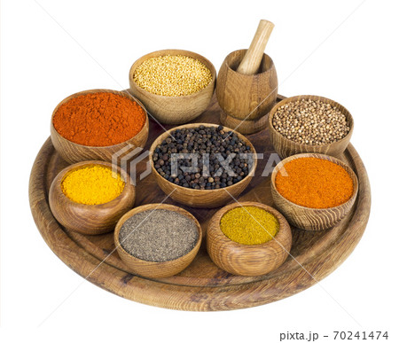 spices and seasoning in wooden bowl on white background spices and seasoning in wooden bowl on white background 70241474