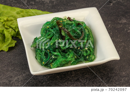 Green Chuka Seaweed Salad Isolated on White Background Top View. Wakame Sea Kelp Salat 70242097