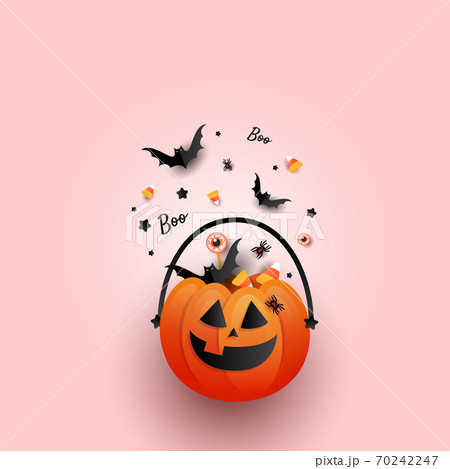 Halloween Jack o Lantern bucket overflowing with candy, bats, spider on pink background. Flat lay, top view with copy space Halloween Jack o Lantern bucket overflowing with candy, bats, spider on pink background. Flat lay, top view with copy space 70242247