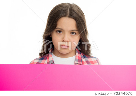 Do not offend children. Girl kid behind pink blank surface Do not offend children. Girl kid behind pink blank surface 70244076