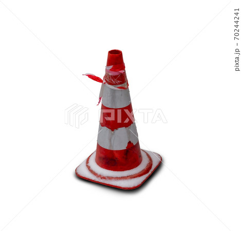 Traffic cone under the snow. Urban, under construction, road work and construction works concept photo. Isolated on white background. 70244241