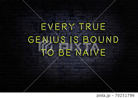 Wise quote. Neon inscription against brick wall Wise quote. Neon inscription against brick wall 70251796