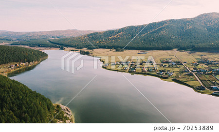 Beautiful large lake in the forest Beautiful large lake in the forest 70253889