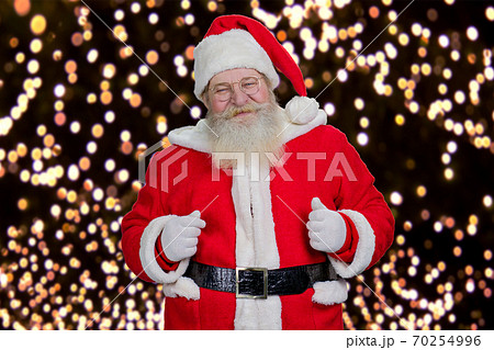 Portrait of bearded smiling Santa Claus. Portrait of bearded smiling Santa Claus. 70254996