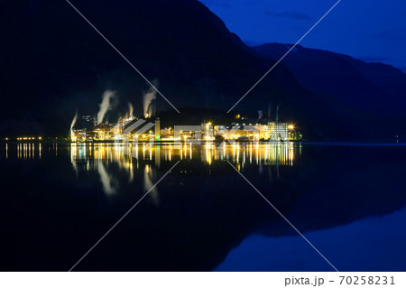 Night city Odda in the reflection of water. Norway Night city Odda in the reflection of water. Norway 70258231