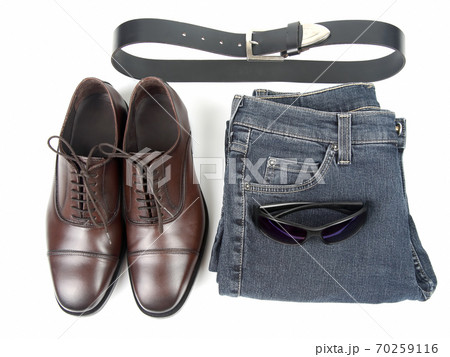 Classic men's brown shoes, belt and clothes on white background 70259116