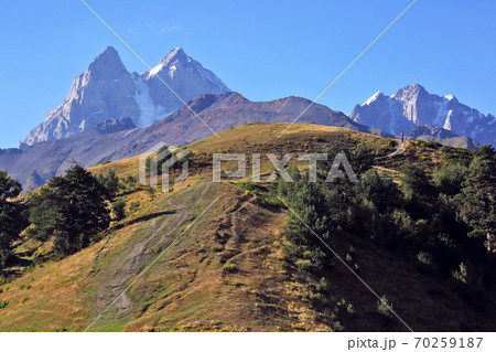 the Caucasus mountain range in Georgia. Ushba Mountain landscape. the Caucasus mountain range in Georgia. Ushba Mountain landscape. 70259187