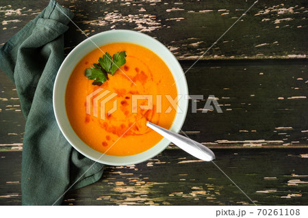 Top view of a healthy vegan winter orange soup Top view of a healthy vegan winter orange soup 70261108