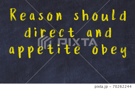 Chalk wise inscription on black chalkboard Chalk wise inscription on black chalkboard 70262244