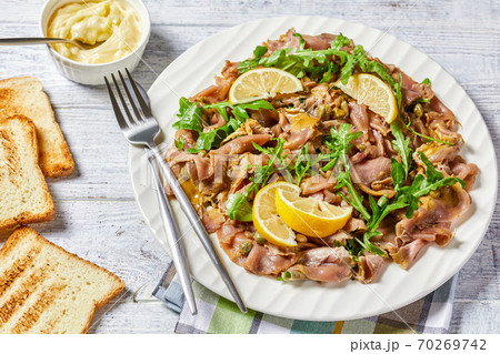 tuna salad with capers, rocket, pine nuts tuna salad with capers, rocket, pine nuts 70269742