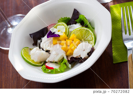Hake ceviche with mango and lime 70272082