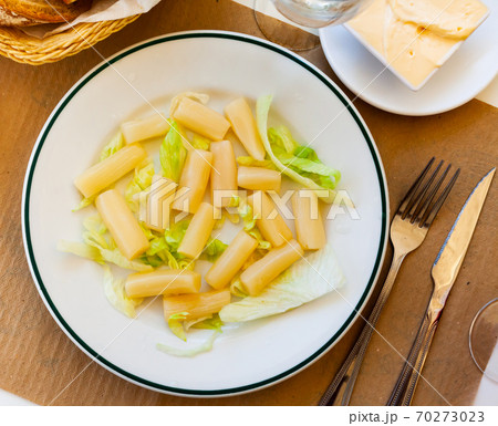 Boiled asparagus on plate served with mayonnaise Boiled asparagus on plate served with mayonnaise 70273023