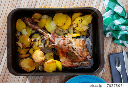 Baked lamb with potatoes in form for cooking, nobody Baked lamb with potatoes in form for cooking, nobody 70273074