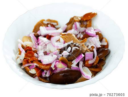 Marinated assorted mushrooms with red onion and greens Marinated assorted mushrooms with red onion and greens 70273603