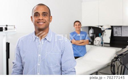 Man satisfied with results of cosmetology procedures in clinic Man satisfied with results of cosmetology procedures in clinic 70277145