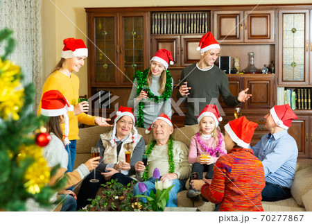 Happy big family celebrates Christmas 70277867