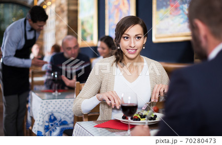 Couple celebrating anniversary in restaurant 70280473