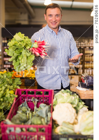 Man buying radish for salad Man buying radish for salad 70280636