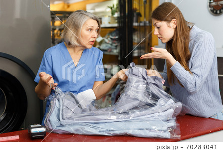 Woman dissatisfied with quality of work 70283041