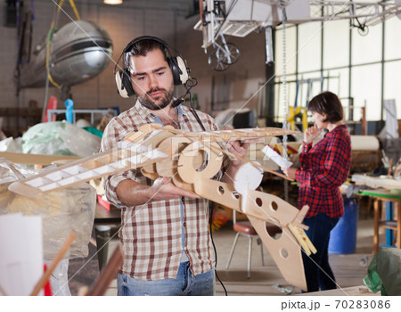 Man modeling airplanes 70283086