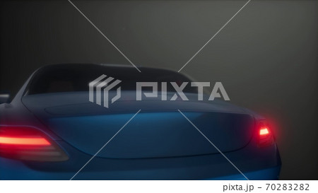 luxury sport car in dark studio with bright lights 70283282