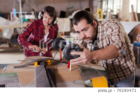 Male creating airplane models Male creating airplane models 70283471