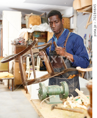 Process of renewing vintage chair 70284645