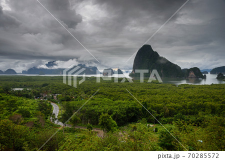 The scenery of the Sametnangshe island with the dramatic sky in Phang Nga province, Thailand. The scenery of the Sametnangshe island with the dramatic sky in Phang Nga province, Thailand. 70285572