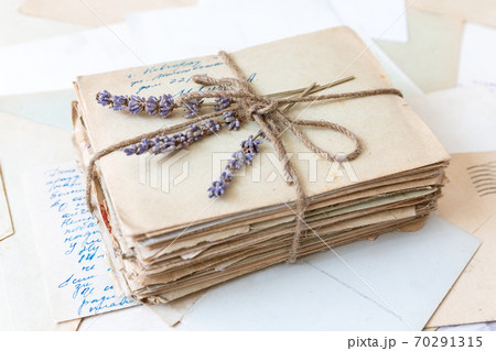 Vintage background with old letters, paper and photos. 70291315