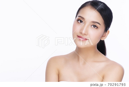 Charming young woman looking at camera smile with clean and fresh skin with positive emotional 70291793