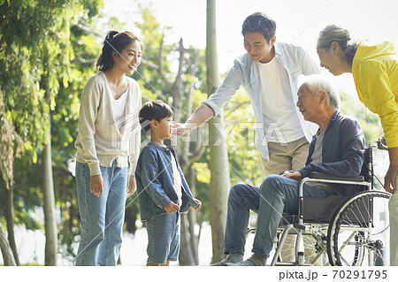 happy asian multi generation family relaxing outdoors 70291795
