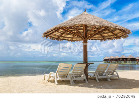 Sunbed and umbrella in the Maldives Sunbed and umbrella in the Maldives 70292048