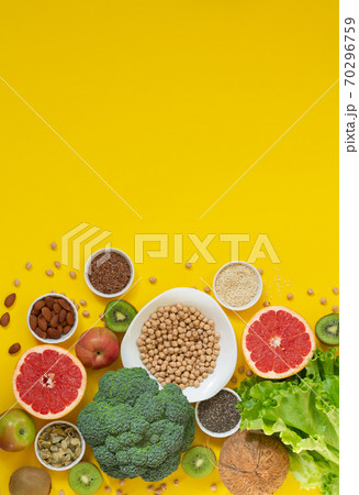 Healthy food and clean eating selection (vegetables, fruit, seeds, nuts, herbs) 70296759