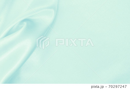 Smooth elegant blue silk or satin luxury cloth texture as abstract background. Luxurious background design Smooth elegant blue silk or satin luxury cloth texture as abstract background. Luxurious background design 70297247