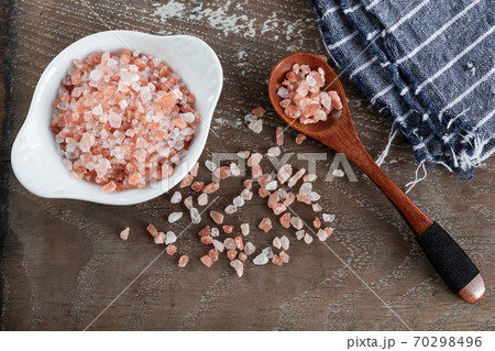 Pink himalayan salt on rustic background 70298496