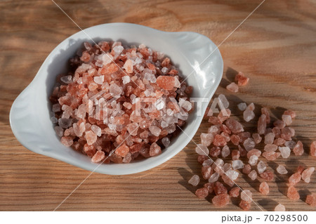 Pink himalayan salt on rustic background 70298500