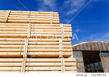 Piles of wooden boards in the sawmill, planking. Piles of wooden boards in the sawmill, planking. 70298516