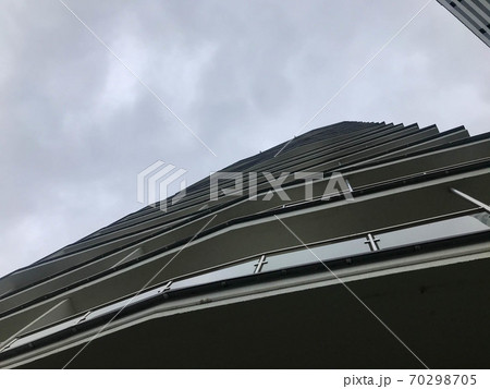 house of an unusual shape in white in the city house of an unusual shape in white in the city 70298705