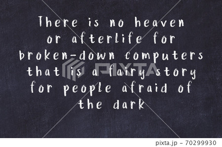 Chalk inscription of smart quote on black desk 70299930