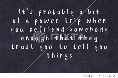 Black chalkboard with wise inscription on it Black chalkboard with wise inscription on it 70301612