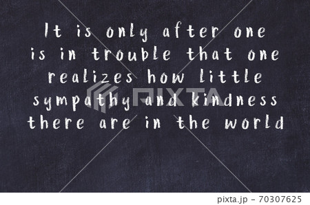 Black chalkboard with wise inscription on it Black chalkboard with wise inscription on it 70307625